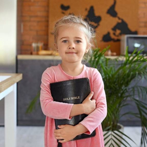 Sunday School child with Bible.