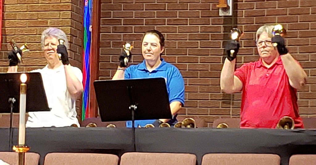 CUMC handbell ensemble performing.